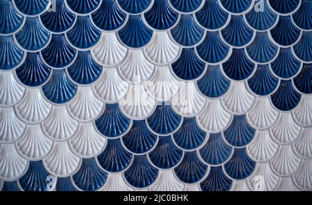 background of ceramic tiles in shell shape in blue and white Stock Photo