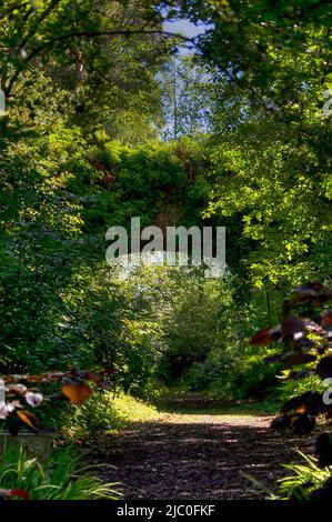 Arched bridge over track at The Garden Station, Restored Victorian railway station, Langley-on-Tyne, Northumberland Stock Photo