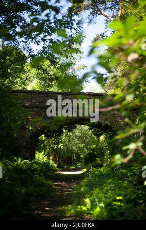 Arched bridge over track at The Garden Station, Restored Victorian railway station, Langley-on-Tyne, Northumberland Stock Photo