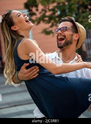 Portrait of happy couple having date and fun on vacation. People travel happiness concept. Stock Photo