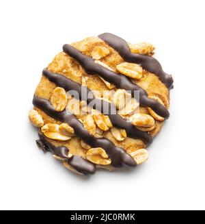 Chip cookies with peanuts and chocolate strips isolated on a white background. Stock Photo