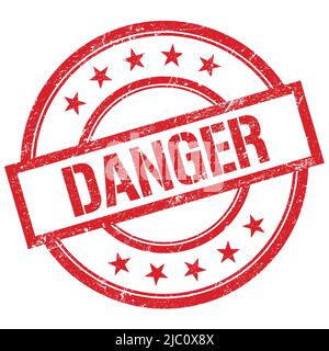 DANGER text written on red round vintage rubber stamp. Stock Photo