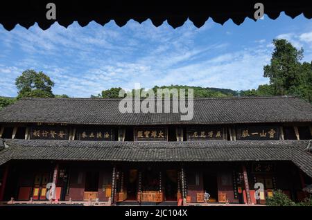 (220609) -- CHENGDU, June 9, 2022 (Xinhua) -- Aerial photo taken on June 7, 2022 shows the interior view of a temple at Mount Emei in southwest China's Sichuan Province. Mount Emei, located in southwest China's Sichuan Province, is an area of striking scenic beauty, notable for its lofty mountain and lush vegetation. It is also of great spiritual and cultural significance, in which there are archaeological sites, important architecture, tombs, ritual spaces, and collections of cultural artefacts, including sculpture, stone inscriptions, calligraphy, and paintings, among other traditional arts Stock Photo