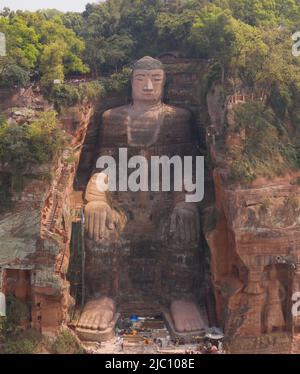 (220609) -- CHENGDU, June 9, 2022 (Xinhua) -- Aerial photo taken on March 29, 2019 shows the Leshan Giant Buddha in southwest China's Sichuan Province. Mount Emei, located in southwest China's Sichuan Province, is an area of striking scenic beauty, notable for its lofty mountain and lush vegetation. It is also of great spiritual and cultural significance, in which there are archaeological sites, important architecture, tombs, ritual spaces, and collections of cultural artefacts, including sculpture, stone inscriptions, calligraphy, and paintings, among other traditional arts. Mount Emei is kn Stock Photo