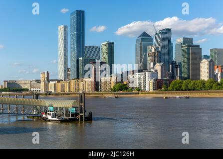 High rise buildings, Canary Wharf, Docklands, London, England, UK Greenland, Surrey Quays, Uber water bus pier Stock Photo