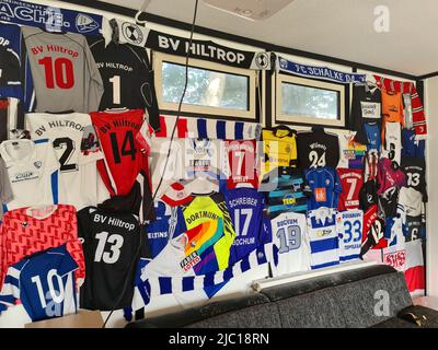 various football tricots as decoration in a clubhouse, Germany Stock Photo