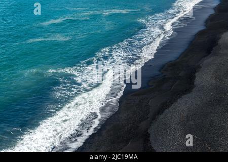 Abstract aerial view of Reynisfjara black sand beach in Iceland Stock Photo