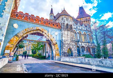 BUDAPEST, HUNGARY - FEBRUARY 23, 2022: The main entrance Gates to Vajdahunyad Castle, the museum complex in City Park, on February 23 in Budapest, Hun Stock Photo