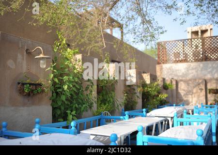 Dubai, UAE: beds for seats inside Arabian Tea House, a charming restaurant serving traditional Arabic food and coffee in Al Fahidi Historical District. Stock Photo