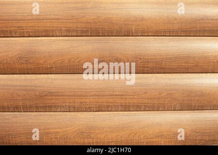 Wood texture. Imitation of wood made of plastic. Log cabin. Stock Photo