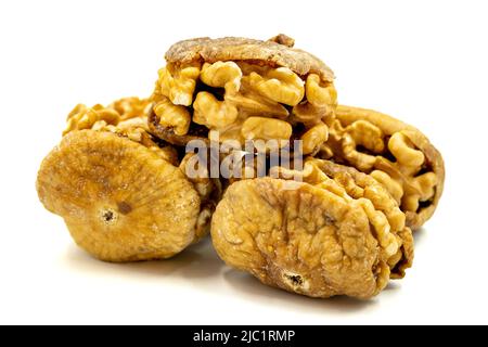 Stuffed dried figs. Dried figs stuffed with walnuts isolated on white background. Close-up. local name cevizli incir Stock Photo