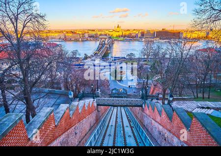 The old funicular rails and panorama of Clark Adam Square with Szechenyi  Chain Bridge, Budapest, Hungary Stock Photo