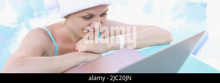 Beautiful woman talk to husband online via video call from holiday Stock Photo