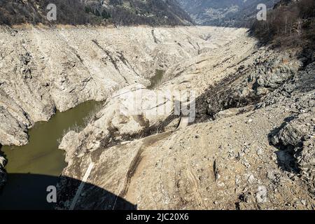 Empty reservoir in the Verzasca Valley, Canton Ticino, Switzerland Stock Photo