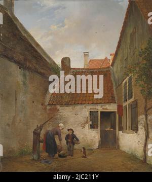 Inner courtyard. A woman fills a kettle with water at a water pump in a courtyard. A boy with a dog standing next to it, over an under door a child looks out., Inner Courtyard, painter: Andreas Schelfhout, (mentioned on object), 1820 - 1830, panel, h 44.8 cm × w 40.3 cm, d 7 cm Stock Photo