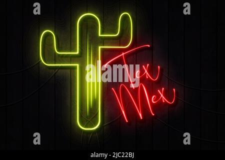 Tex Mex Neon Sign on a Dark Wooden Wall Stock Photo