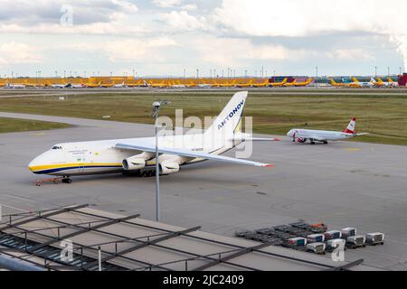Schkeuditz, Germany - 29th May, 2022 - Many big An-124-100 ukrainian Ruslan cargo jets parked on Leipzig Halle airport terminal tarmac apron for Stock Photo