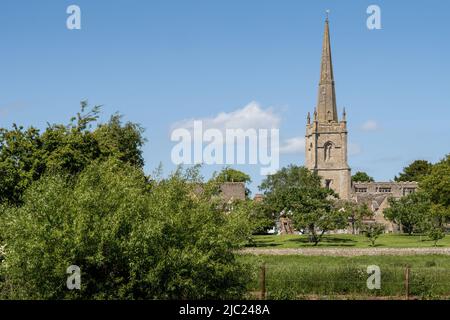 View across the River Thames to St Lawrence Church, Lechlade, Gloucestershire. UK. Stock Photo