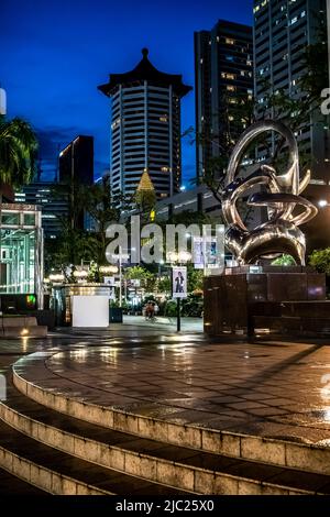 Stage in front of Ngee Ann City at night. It is a shopping and commercial centre located on Orchard Road, Singapore. Stock Photo
