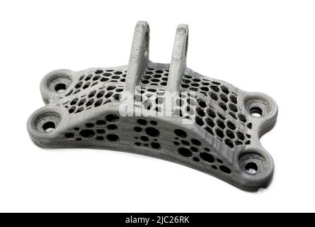 Model printed on a 3d printer made of cement concrete isolated on a white background close-up. Additive automation manufacturing 3D printing technology. Concept new modern 3d printing technologies. Stock Photo
