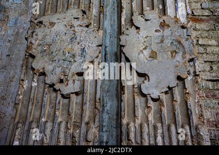 Interior decoration of an ancient building destroyed by time and war. Stock Photo