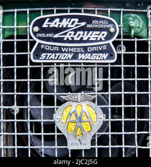 Land Rover Station Wagon logo and lettering on the rustic radiator grille of the classic off-road vehicle from England in Hildesheim, Germany, May 21, Stock Photo