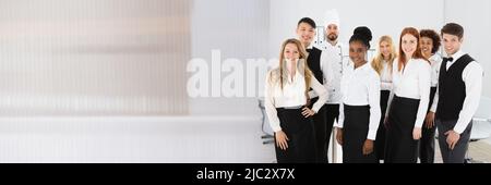 Group Of Confident Multi Ethnic Restaurant Staff Stock Photo