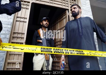 View of venue while security officials are cordon off the site for investigation is underway after death of Tehreek-e-Insaf (PTI) MNA and TV personality Dr. Amir Liaquat Hussain at his home located on Khudadad Colony in Karachi on Thursday, June 09, 2022. PTI MNA and TV personality Dr. Amir Liaquat Hussain passed away in Karachi on Thursday, Geo News reported, quoting his servant Javed and hospital officials. He was 50. The PTI leader was found unconscious at his home and shifted to a private hospital in a critical condition where he was declared dead. Stock Photo