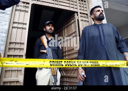 View of venue while security officials are cordon off the site for investigation is underway after death of Tehreek-e-Insaf (PTI) MNA and TV personality Dr. Amir Liaquat Hussain at his home located on Khudadad Colony in Karachi on Thursday, June 09, 2022. PTI MNA and TV personality Dr. Amir Liaquat Hussain passed away in Karachi on Thursday, Geo News reported, quoting his servant Javed and hospital officials. He was 50. The PTI leader was found unconscious at his home and shifted to a private hospital in a critical condition where he was declared dead. Stock Photo