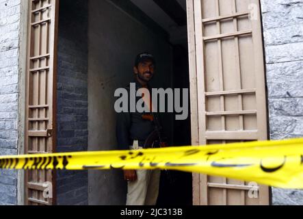 View of venue while security officials are cordon off the site for investigation is underway after death of Tehreek-e-Insaf (PTI) MNA and TV personality Dr. Amir Liaquat Hussain at his home located on Khudadad Colony in Karachi on Thursday, June 09, 2022. PTI MNA and TV personality Dr. Amir Liaquat Hussain passed away in Karachi on Thursday, Geo News reported, quoting his servant Javed and hospital officials. He was 50. The PTI leader was found unconscious at his home and shifted to a private hospital in a critical condition where he was declared dead. Stock Photo