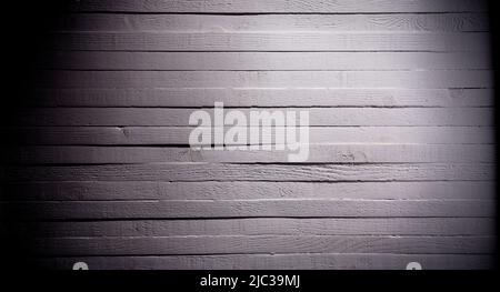 Old wooden wall. Spot light on white wall. Empty text space for banner. panoramic white horizontal wooden surface Stock Photo