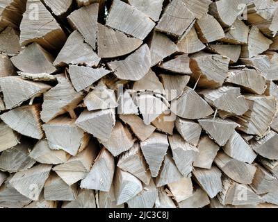 Stacked firewood for the winter season Stock Photo
