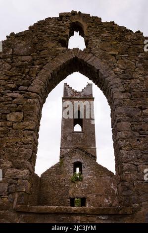 Crow stepped battlements embellish the tower at Neale Cemetery in south County Mayo, Ireland. Stock Photo