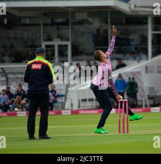 Chris Green Bowls from the Nursery end in a T20 Blast Match against Surrey on the 9th of June 2022 Stock Photo