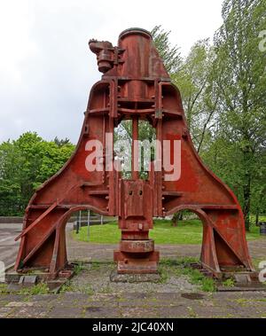 Cast iron steam hammer, made by B&S Massey Ltd ,Manchester at Blaenavon, outside the Big Pit, British steelmaking heritage Stock Photo