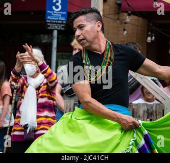 Portrait of a dancer from Ensamble Folclorico Colibri performing during the Sonoma County Pride parade in downtown Santa Rosa. Stock Photo