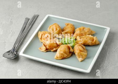 Korean Fried Mandu Dumplings, Made from Meat, Chicken, or Pork with Dumpling or Wonton Skin Stock Photo