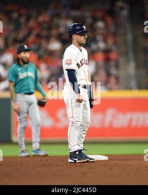 Houston Astros third baseman Alex Bregman (2) throws to first in the eighth  inning against the Seattle Mariners, Wednesday, May 4, 2022, in Houston, T  Stock Photo - Alamy