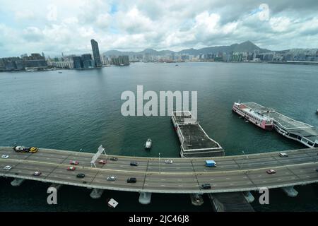 The island eastern corridor highway and the Victoria Harbour in Hong Kong. Stock Photo