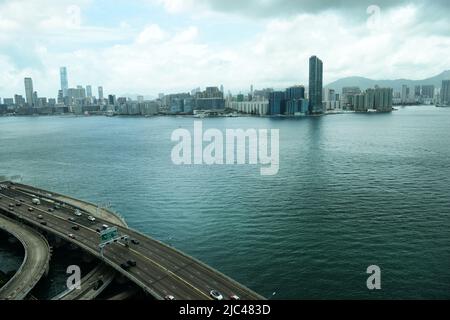 The island eastern corridor highway and the Victoria Harbour in Hong Kong. Stock Photo