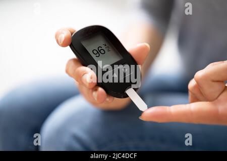 Blood Sugar Level. Diabetic Glucose, Diabetes Glucometer Stock Photo