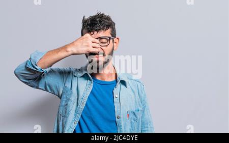 Man with nasal bridge pain isolated. Person with pain touching nose ...