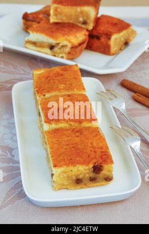 Swabian cuisine, Kirchweihkuchen on serving platter, cake forks, Swabian baking speciality, from the oven, baked, sweet cake, covered apple pie Stock Photo