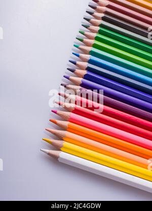 Color Pencils of Various colors placed on white background Stock Photo