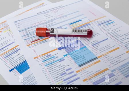 blood probe and request form for analysis in a laboratory Stock Photo