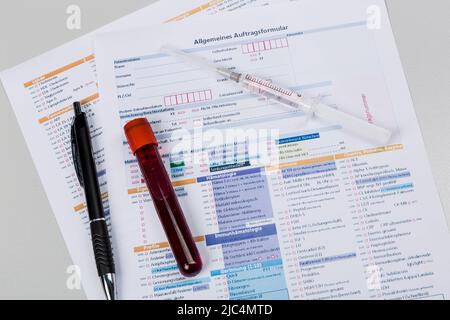 blood probe and request form for analysis in a laboratory Stock Photo