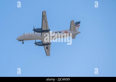 10 June 2022. A Regional Express Airlines (REX) Saab 340B commuter aircraft VH-RXN on approach to Adelaide International Airport, Adelaide, Australia Stock Photo