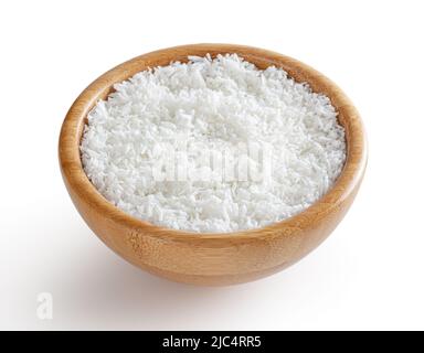 Coconut flakes in wooden bowl isolated on white background with clipping path Stock Photo