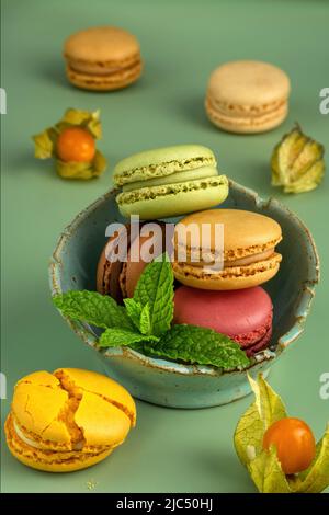 Delicious Sweet Colorful Macaroons on a colorful background Stock Photo