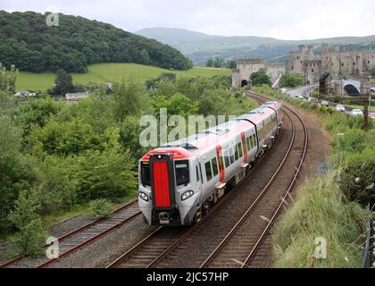 Transport for Wales new class 197 Civity dmu on the North Wales Coast Line between Llandudno Junction and Conwy on Thursday 9th June 2022. Stock Photo